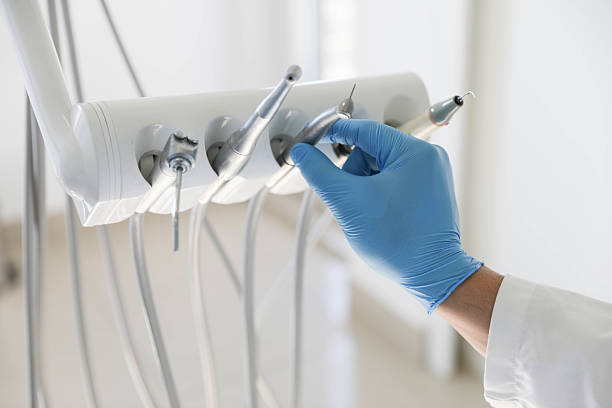 Professional Invisalign Clear Aligners technician working in D'Iberville, MS